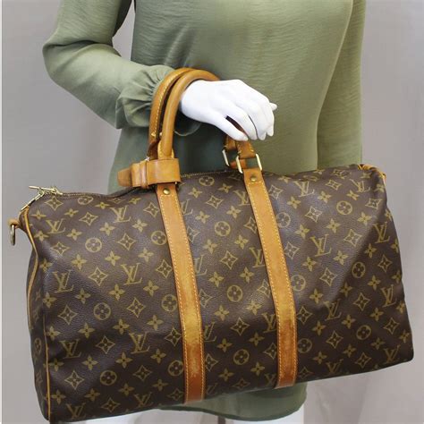 LV Keepall 45 vs Chanel Boston Duffle 